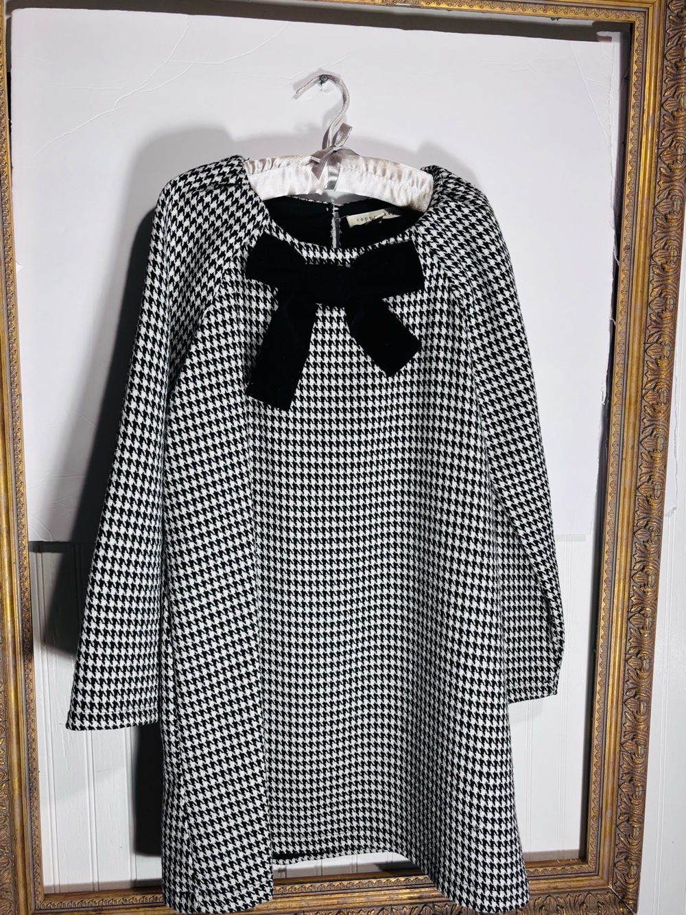Black and white houndstooth long sleeve dress with charming black velvet bow